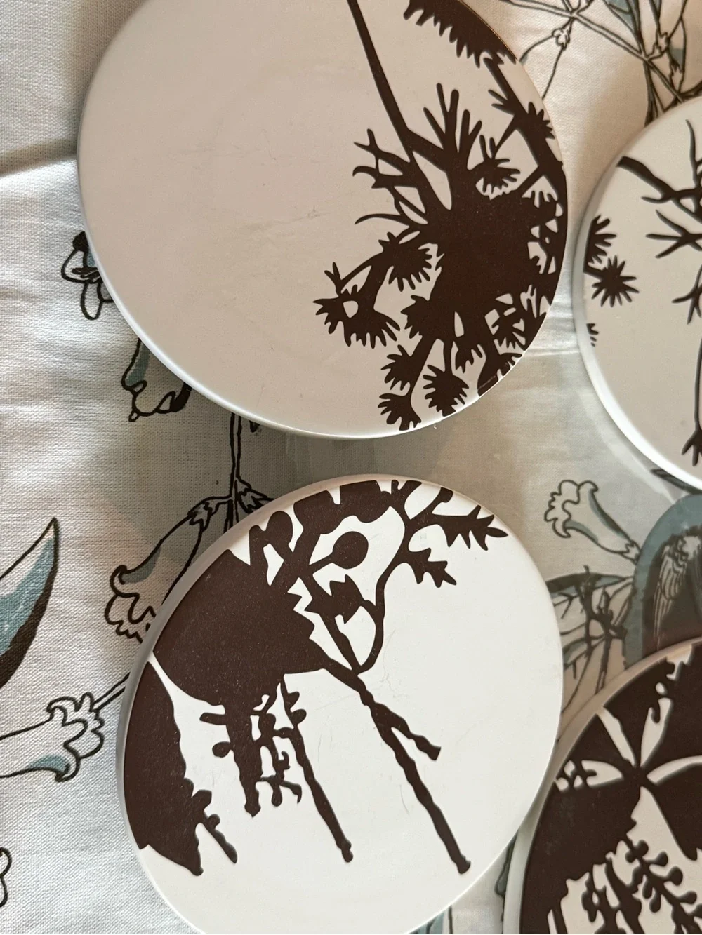 West End Round Botanical Wall Coasters White w/ Dark Brown Silhouettes -set of 5